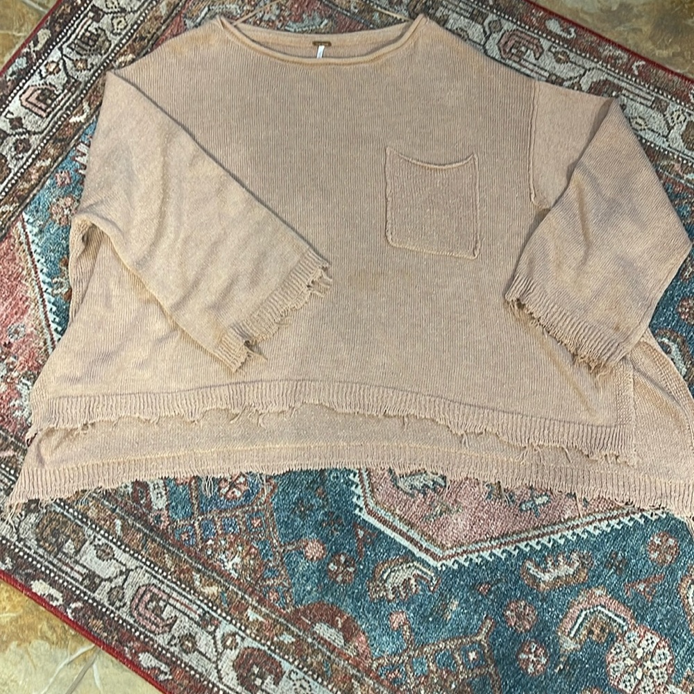 Free People raw edge oversized, lightweight sweater.
